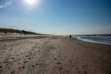 Man walking on the sea side