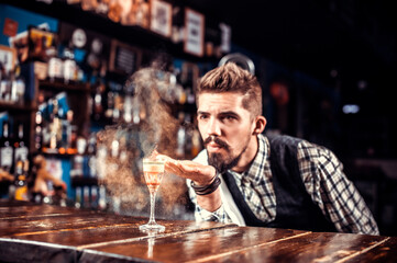Bartender creates a cocktail in the pothouse