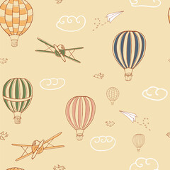 Colorful seamless vector pattern, hand drawn hot air baloons flying in the sky. Pattern for backgrounds, wrapping paper, fabrics and bed clothes