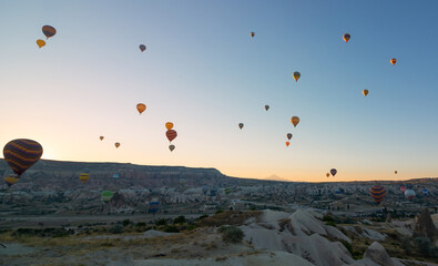 Cappadocia balloons. Hot air balloons in Goreme at sunrise.