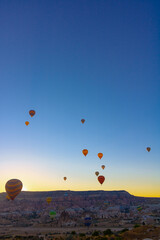 Cappadocia balloons. Hot air balloons in Goreme at sunrise.