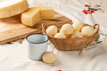 Fototapeta na wymiar Cheese bread, breakfast table in Brazil, cheese bread, coffee and accessories, selective focus.
