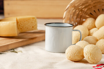 Cheese bread, breakfast table in Brazil, cheese bread, coffee and accessories, selective focus.