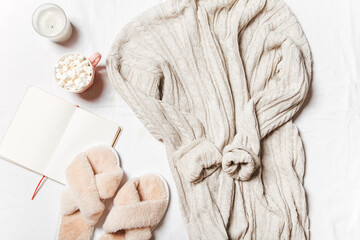 winter clothes on a white background, cozy winter 