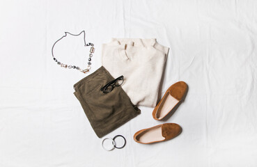 top view of flat lay clothes and accessories
