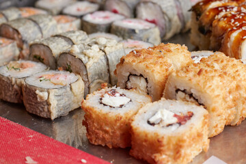 sushi set on the table, macro, close-up, various sushi and rolls, food, asian cuisine