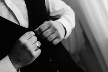 close up of a businessman holding their hands