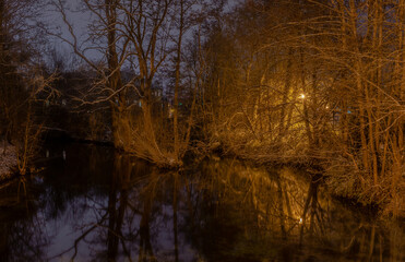 branching river at night time in winter 