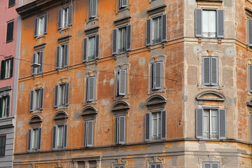 Fototapeta na wymiar Orange-Brown Aged House Facades in Rome, Italy