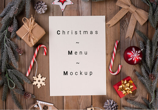 One Page Christmas Menu on Wooden Restaurant Table with Holyday Decoration