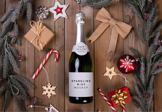 Champagne Bottle Flat Lay on a Wooden Table with Christmas Decoration