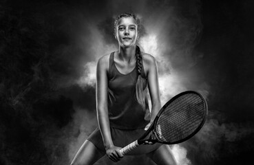 Tennis player. Beautiful girl teenager and athlete with racket in sporswear and hat on tennis...