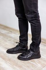 Men's black winter boots with genuine leather. Stylish men's shoes