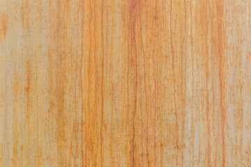 Naklejka premium Orange or yellow old rusty dirty metal surface with abstract worn iron pattern background texture