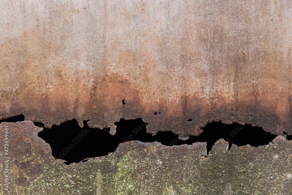 Wall mural rusted metal surface with hole old dirty rusty iron worn background texture