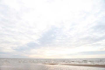 Obraz premium Beautiful seascape shore view with sand and Baltic sea.