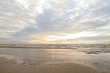 Fototapeta na wymiar Beautiful seascape shore view with sand and Baltic sea.