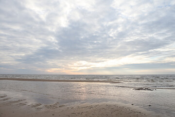 Fototapeta na wymiar Beautiful seascape shore view with sand and Baltic sea.