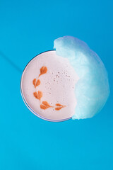 The exotic cocktail and fruit on color background