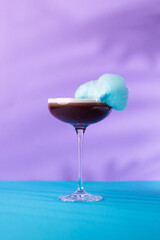 The exotic cocktail and fruit on color background