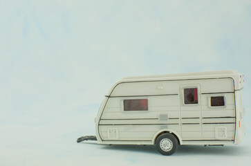 Motorhome  camper van trailer toy on ligth background