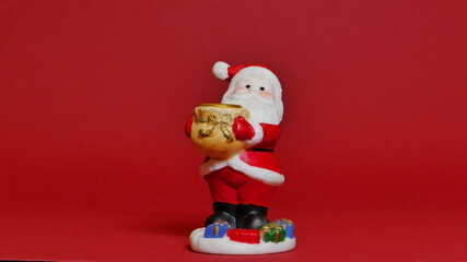 Santa claus figure on red background