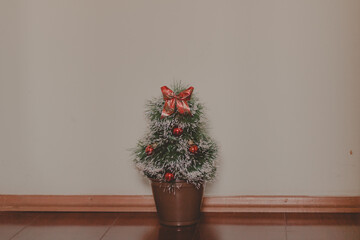 Fototapeta premium christmas tree on wooden floor with white background