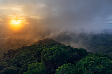 A sunset over the hills and misty forest @ Anoia, Catalonia, Spain.