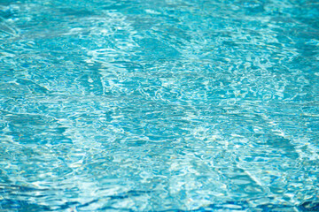 Water in swimming pool, background with high resolution. Wave abstract or rippled water texture.