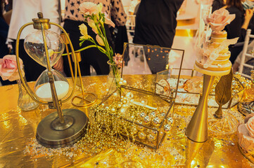 glittering golden balls and shining objects symbolizing wealth and romance on a wedding exhibition in shenzhen, china