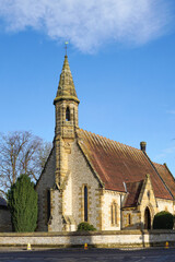 Fototapeta na wymiar Harome, England - 26 November 2021 - The exterior of St Saviour's Church, a Grade II listed Church of England Church in Harome, North Yorkshire, England. The architect was Charles Barry Jr.