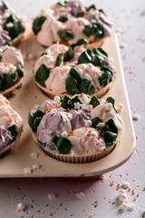 Unique cupcakes made of white cream for fat thursday.