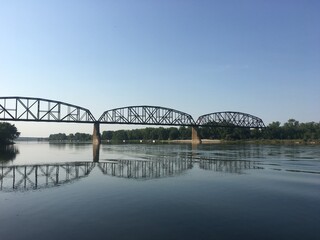 Fototapeta na wymiar Bridge Reflection in River