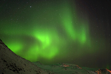 Huge shinning northern lights in north Norway close to north cape