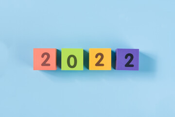 happy new year 2022 colorful cube on blue background