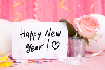 Happy new year - card with text, pink air balloons and decorations on colorful background