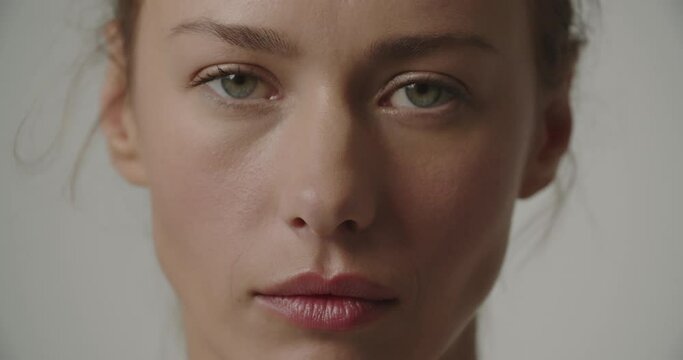 Beautiful Green Eyed Young Woman Raising Eyebrow