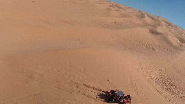 Desert Off-road Vehicles in the Sand Dunes