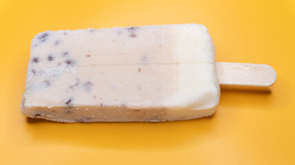 fresh red bean popsicle on a yellow background
