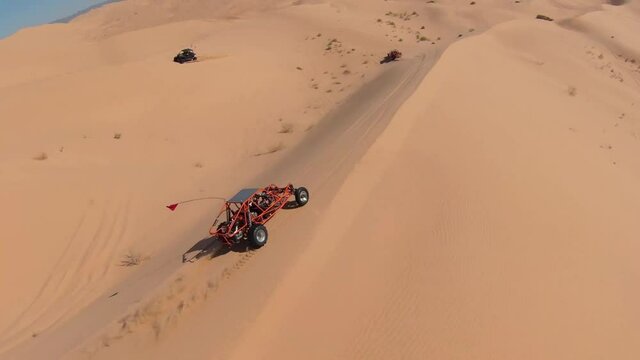 Desert Off-road Vehicles in the Sand Dunes