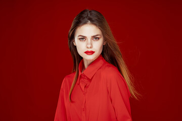 woman in red shirt posing fashion red lips fun