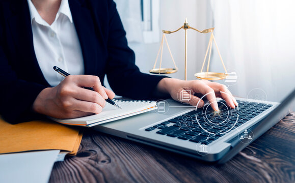 Business and lawyers discussing contract papers with brass scale on desk in office. Law, legal services, advice, justice and law concept picture with film grain effect