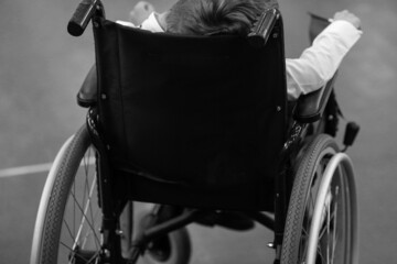 Obraz premium Ill disabled young boy in a wheelchair.