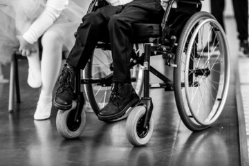 Obraz premium Ill disabled young boy in a wheelchair.