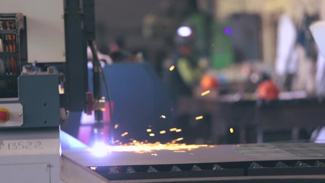 Cutting metal plasma cnc machine close up. Plasma cutting for metal. Cutting a metal part with a pasma.