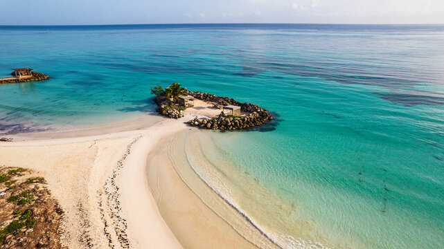 Rock island with sand bridge in Jamaica 