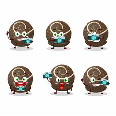 Photographer profession emoticon with truffle chocolate candy cartoon character