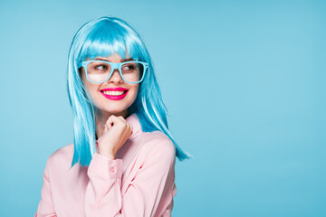 pretty woman in pink shirt purple wig glasses red lips