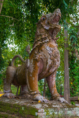 Ancient dragon sculpture on the ruins of Wat Phrathat Chedi Luang Buddhist temple. Chiang Saen, Thailand