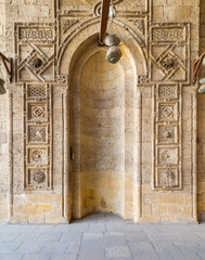 Engraved decorated stone wall with embedded niche in Mamluk era historical public mosque of Sultan...
